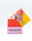 Colorful playing card set with Hilma af Klint's geometric design on a white background