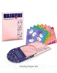 Charley Harper origami set with its pink folder and animal patterned origami papers