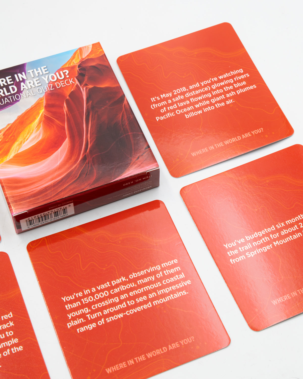 Orange Where in the World Are You? clue cards describing a place to guess
