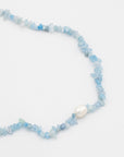 blue resin puka necklace with pearl
