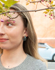 girl wearing The Shorebreak blue resin hoop earrings