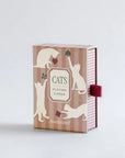 Roomytown Cats playing cards box in dusty rose stripes with white cat cutouts