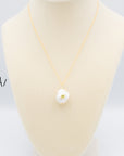 Baroque Pearl Pendant With Set-In Gemstone