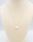 Pearl Pendant With Set-In Gemstone