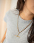 Antique T-bar chain necklace shown full length with vintage brass clasps