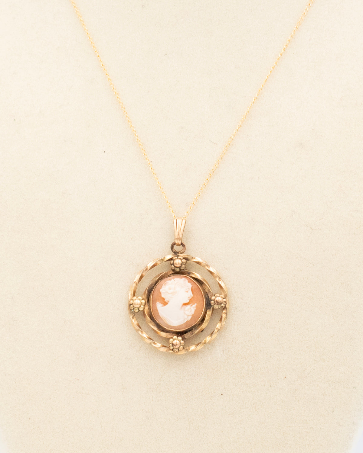 Close up of shell cameo in 10K gold-filled Etruscan Revival frame with forget-me-not accents on 18&quot; gold-filled chain