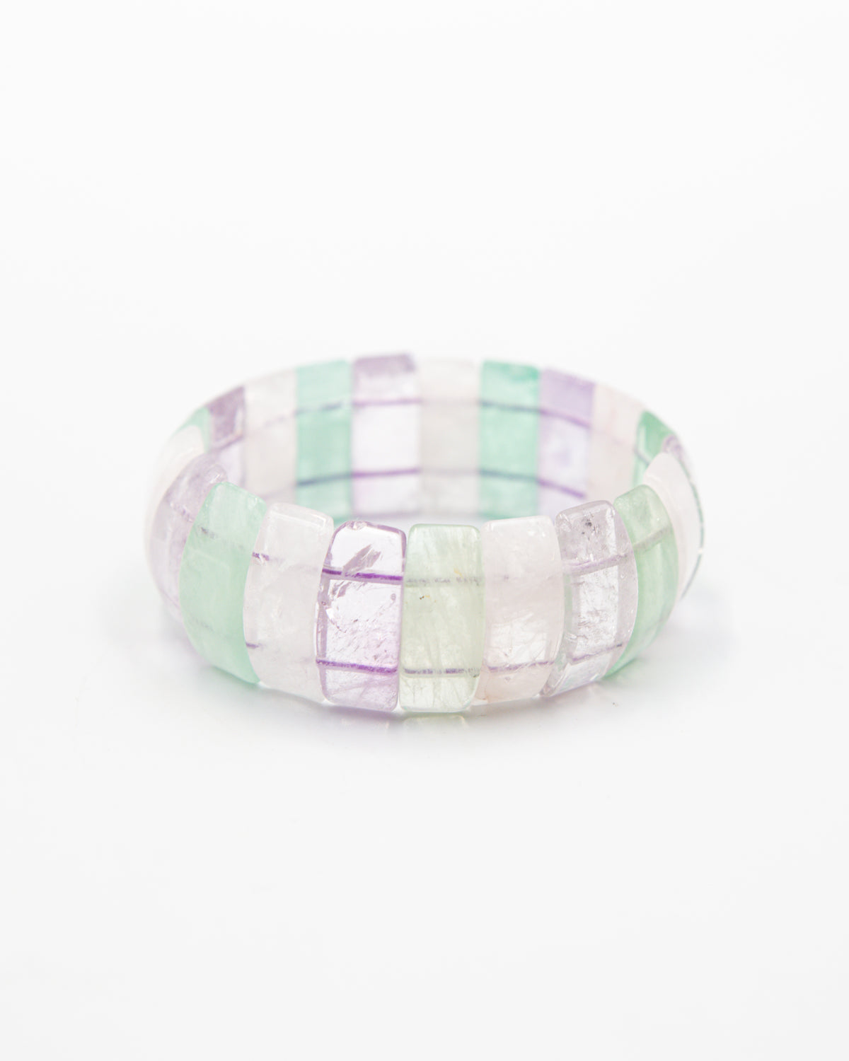 Single fluorite beaded stone bracelet with translucent green, purple, and clear beads photographed flat against a white background.