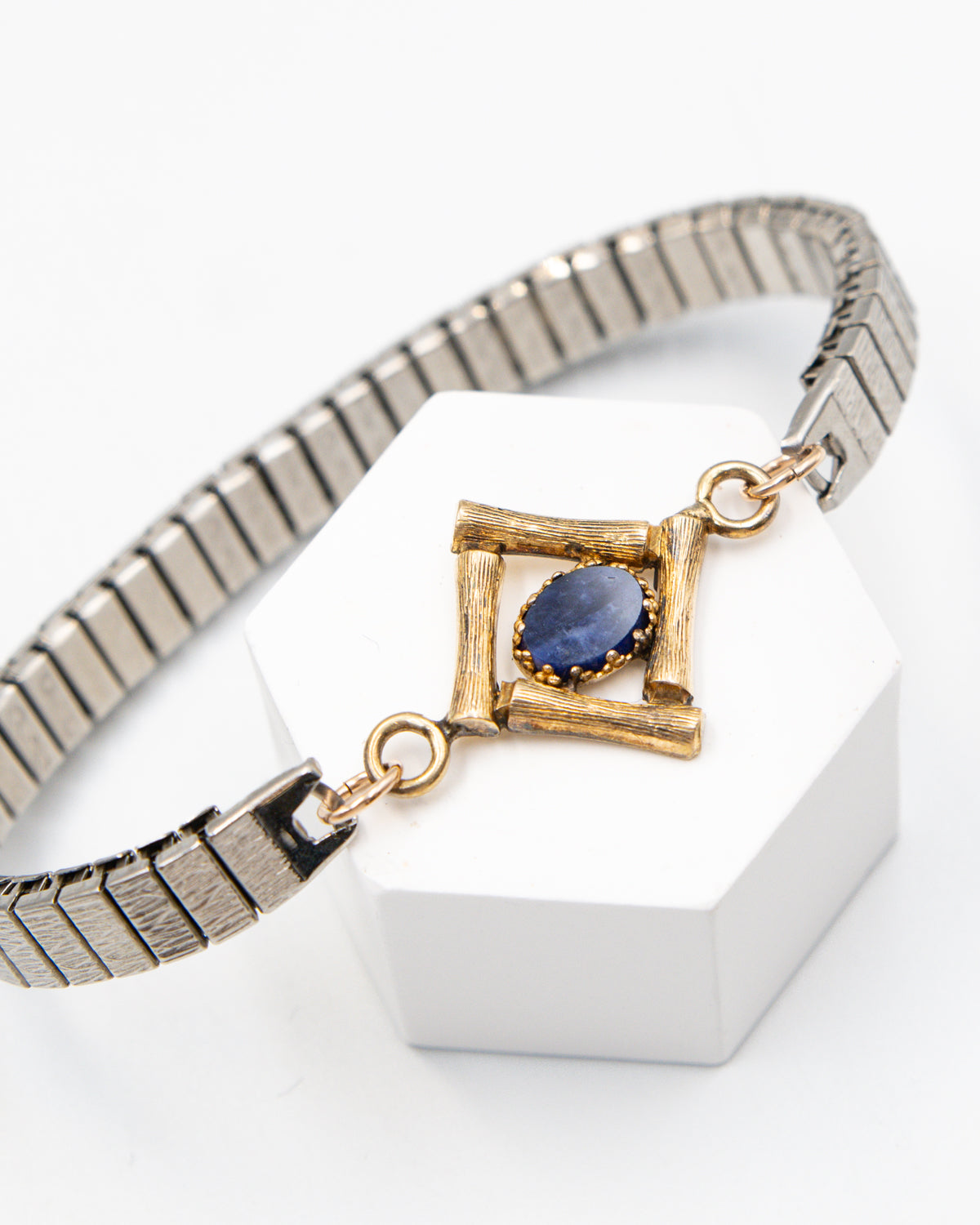 Friend of Winter bracelet with a lapis stone in gold-fill bamboo links on a silver watch band