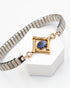 Friend of Winter bracelet with a lapis stone in gold-fill bamboo links on a silver watch band