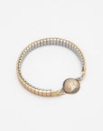 Vintage bracelet with gold expansion brand and hand-painted sailboat design on a white background