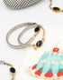 Vintage onyx watch band bracelet with gold-filled setting and reclaimed stainless steel band — sleek mid-century jewelry.