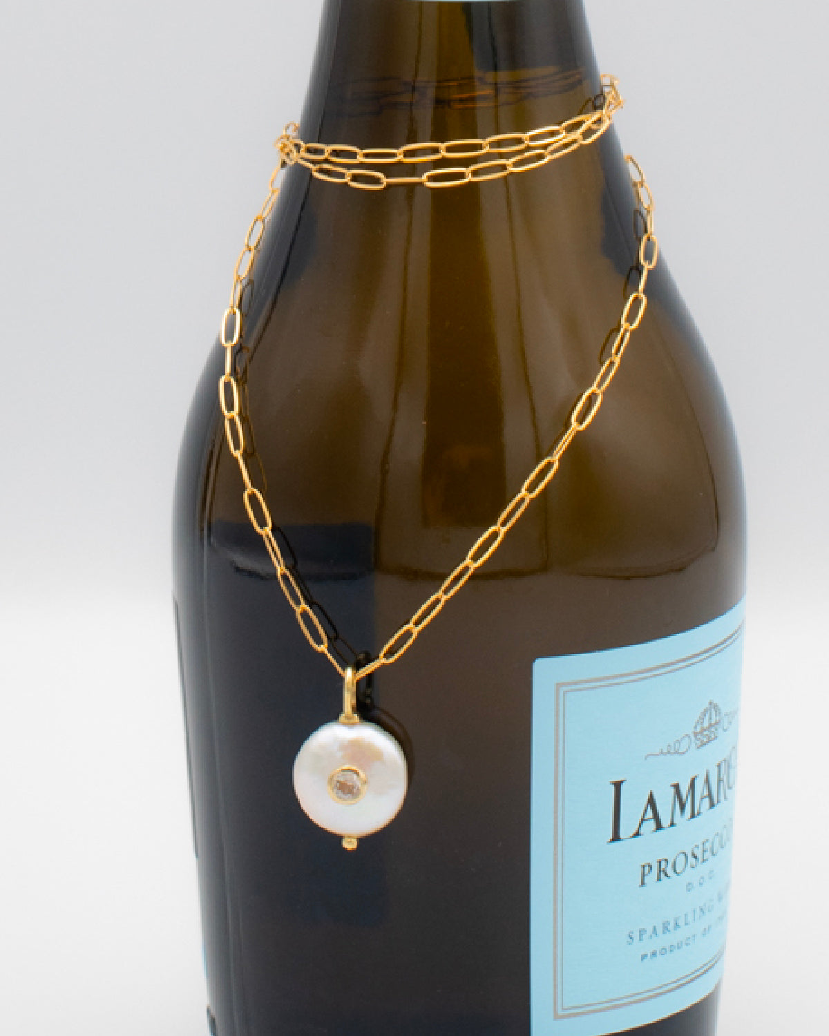 Pearl Pendant With Set-In Gemstone