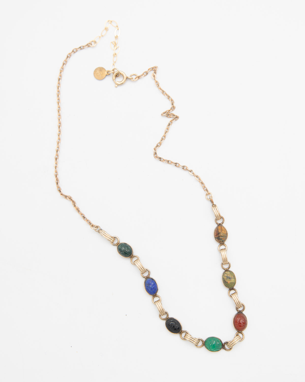 Antique gold-filled chain scarab necklace with colorful cabochon stones.
