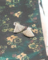 Pair of vintage sterling silver fan stud earrings on dark green floral fabric