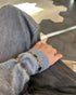 Vintage onyx gold-filled bracelet worn with a gray sweater