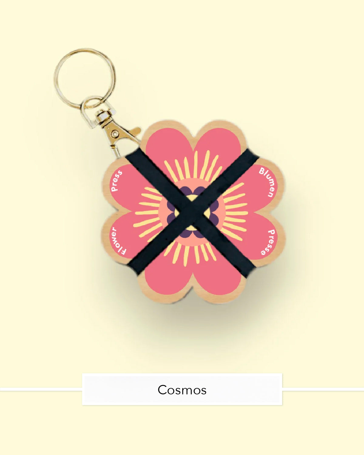 Studio Wald flower press keychain in the Cosmos design in coral and pink