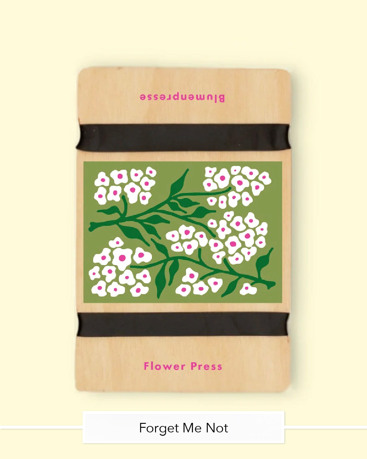 Studio Wald wooden flower press in the Forget Me Not design with tiny white flowers