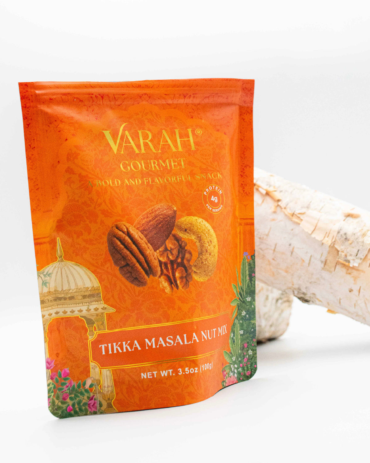 Varah Gourmet Tikka Masala Nuts pouch in orange with an illustrated palace