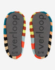 Gray grippy soles of the Verloop house slippers, stamped with the logo and size S/M
