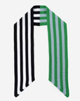 Verloop mini ribbon scarf laid flat, half black and white stripes, half green and blue