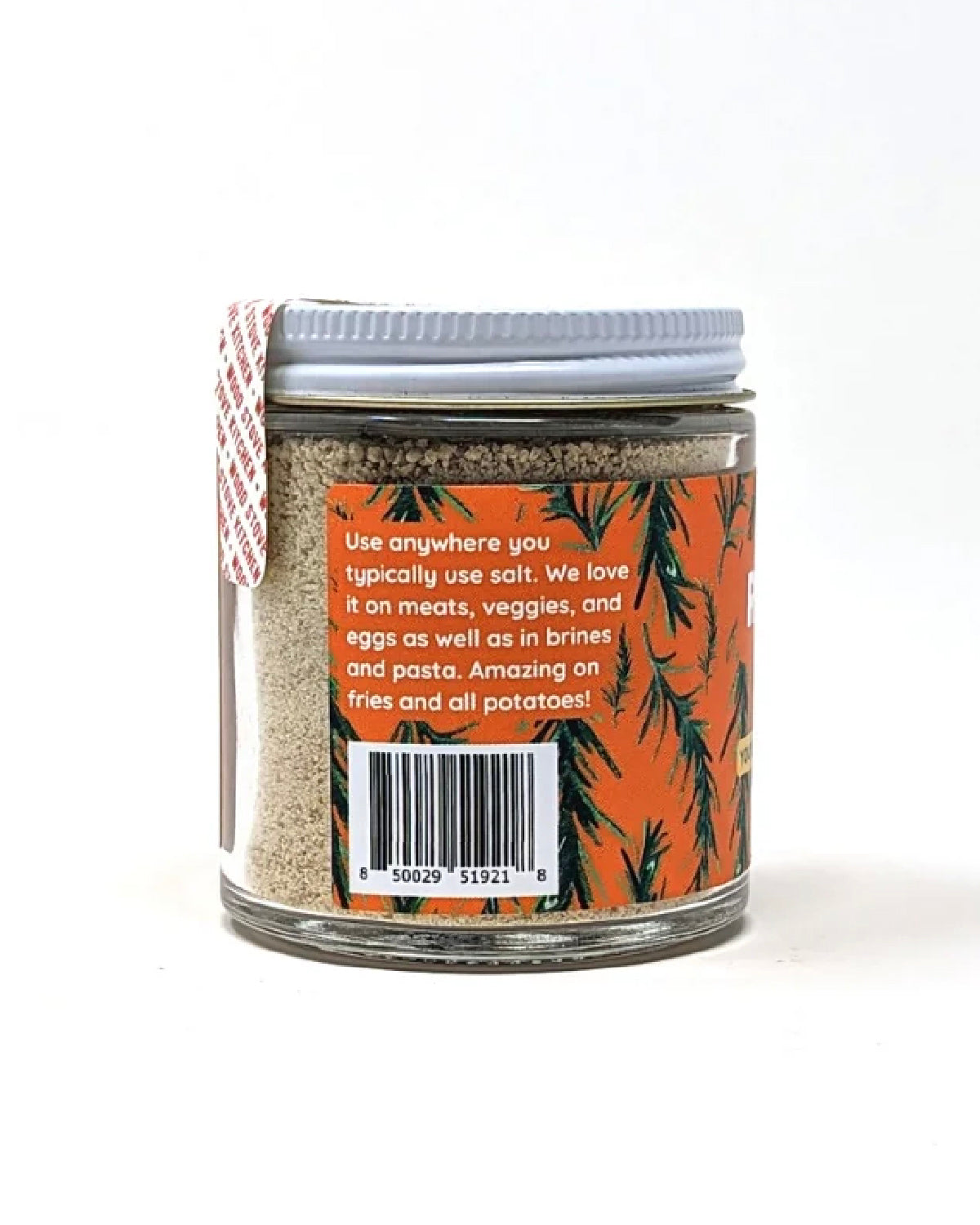 Side of the rosemary salt jar with usage tips and a barcode