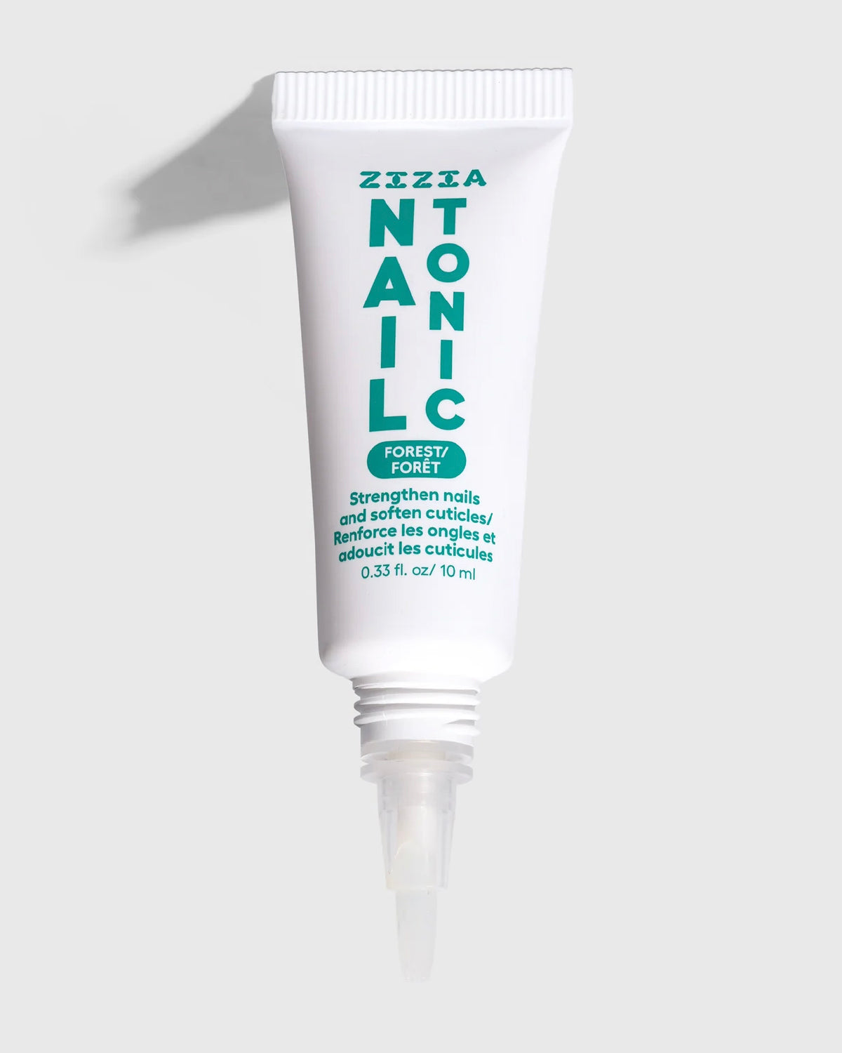 Zizia Nail Tonic tube with its precision applicator tip on white